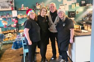 Ed Robertson of Barenaked Ladies (second from r), clearly got the message about shopping local: the morning after performing in Ashcroft on the CPKC Holiday Train on Dec. 18, he dropped by the Ashcroft Bakery for breakfast and coffee (and you can bet it didn&rsquo;t cost him a million dollars). (Ashcroft Bakery and Coffee Shop/Facebook)